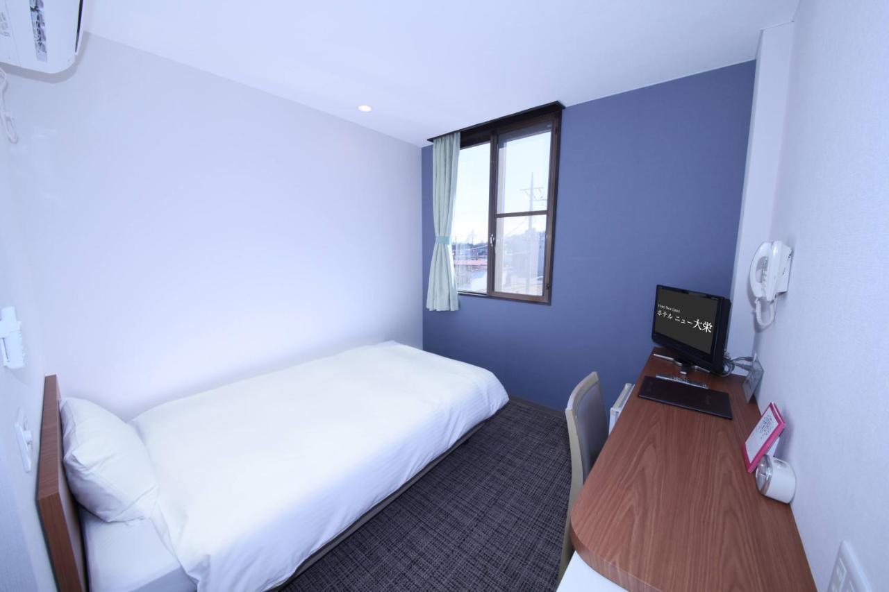 Business Hotel New Daiei Ashikaga Bagian luar foto